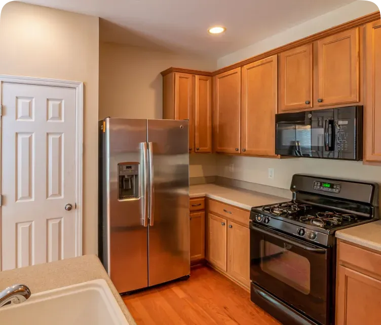 Renovated kitchen with new cabinetry and countertops
