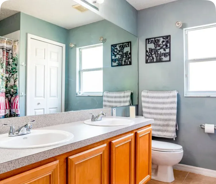 Renovated bathroom with new fixtures and tile