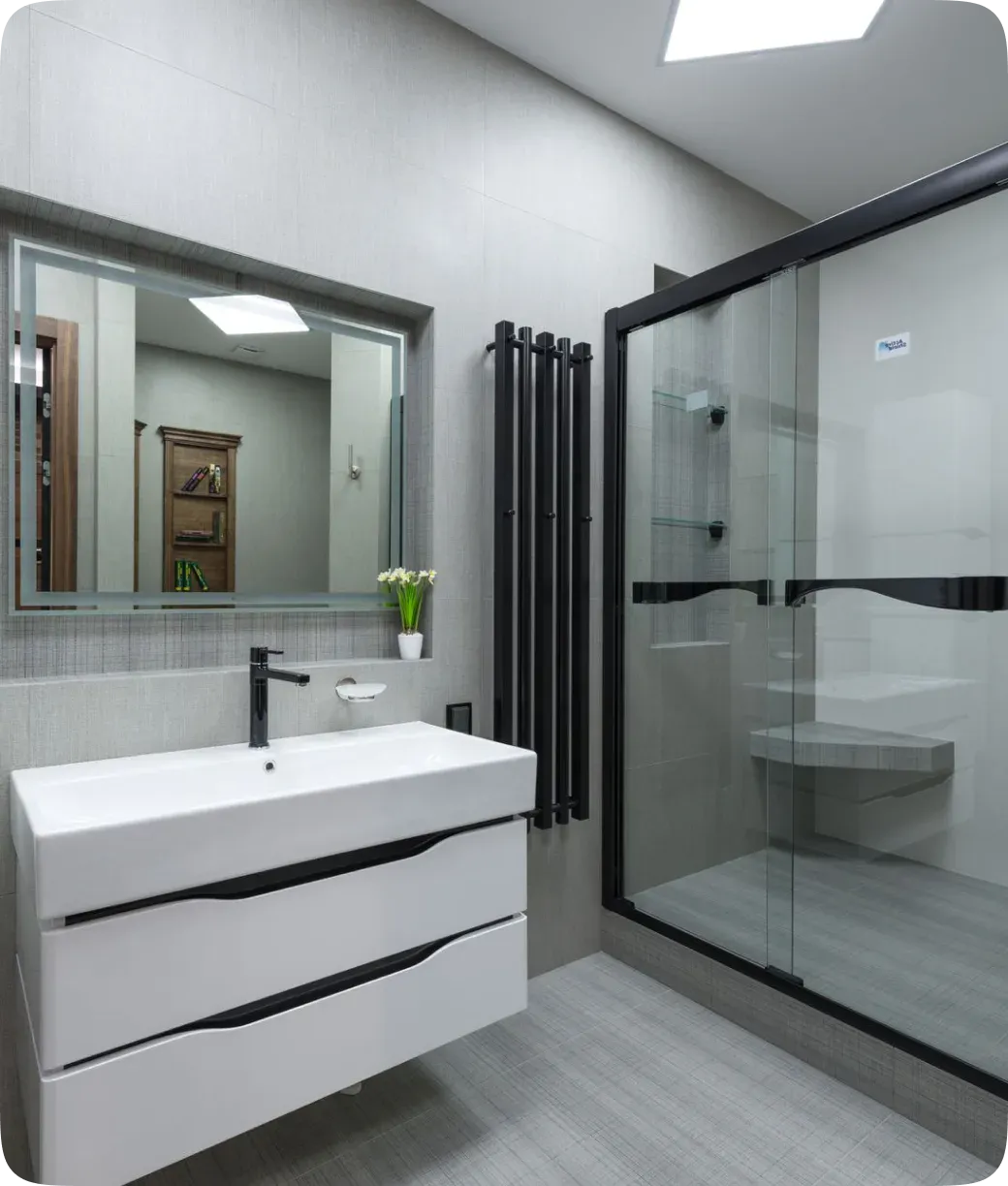 Renovated bathroom with a glass shower and floating vanity