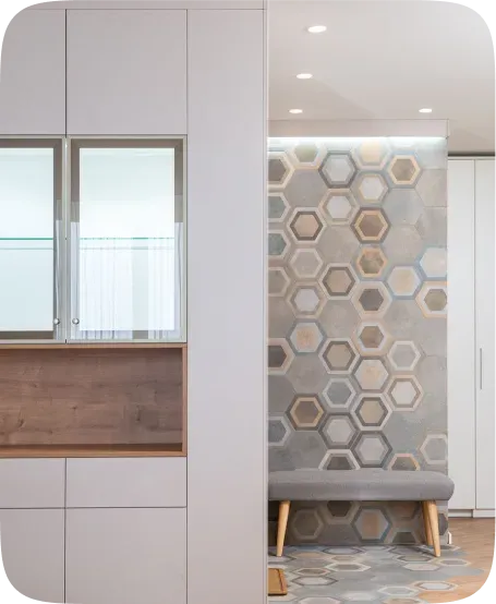 Hexagon-patterned feature wall finish in an entryway